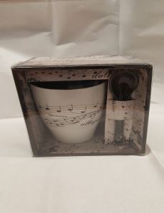 Tasse à café avec cuillère au motif musical